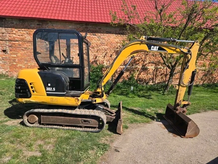 minirypadlo Caterpillar CAT - 13