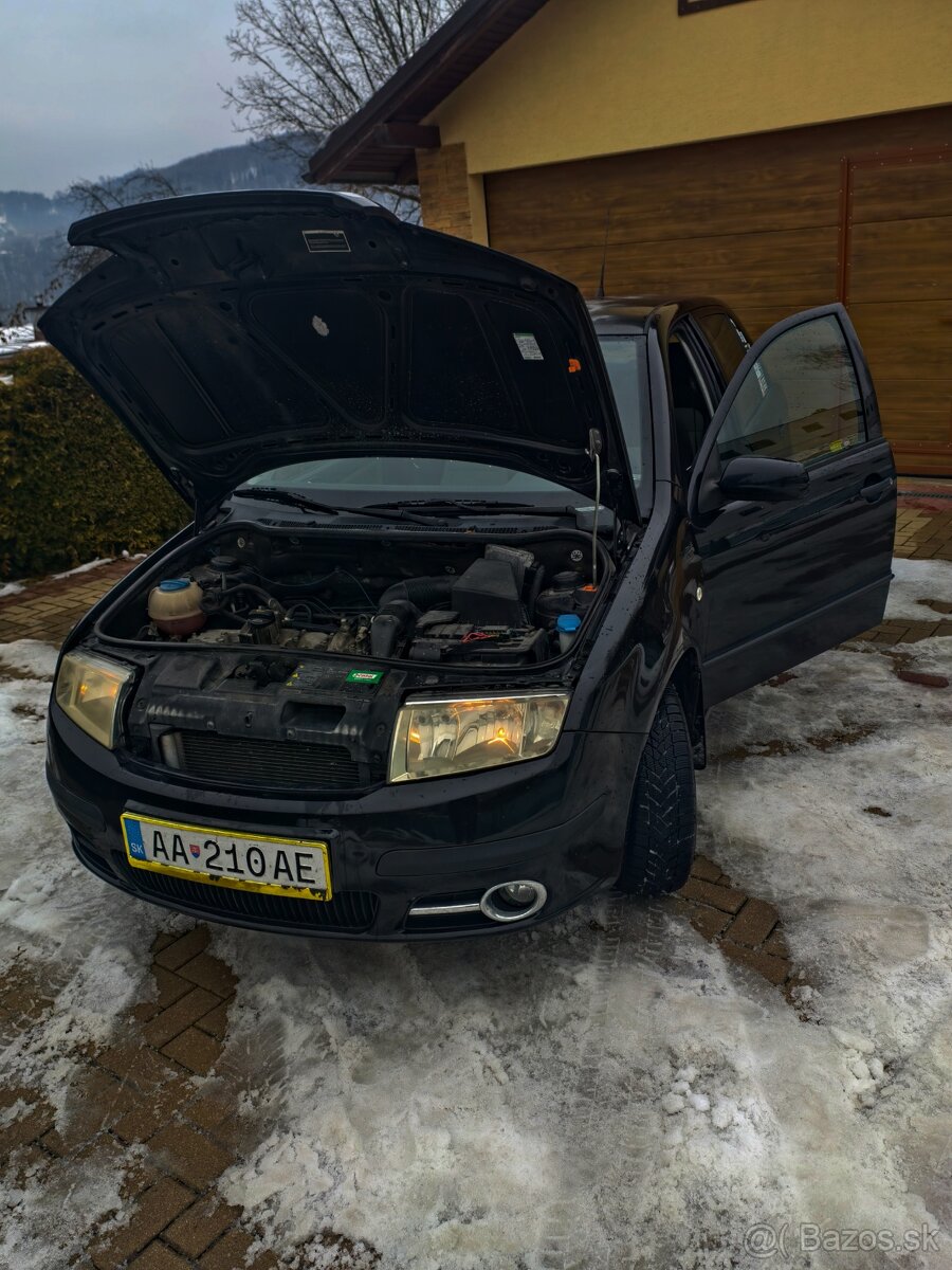 Škoda Fabia 1.2i - 13