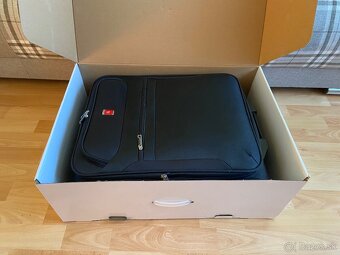 Malý cestovný kufor. - 13