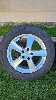 Predám zimné pneu Dunlop na diskoch Dezent R17 - 13