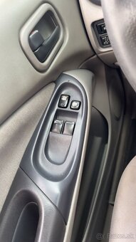 Nissan Almera N16 - 13