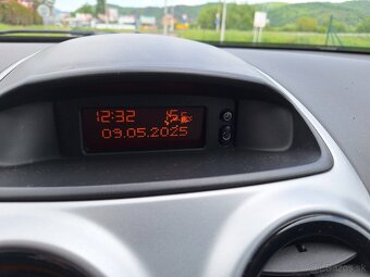 Opel Corsa 1.2 16V Essentia - 13