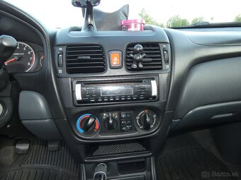 Nissan Almera - 13