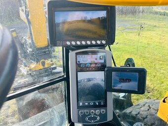 Kolesové rypadlo Caterpillar M316F - 13