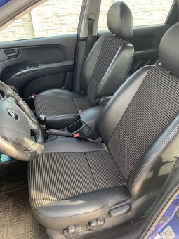 KIA Sportage 2.0crdi - 13