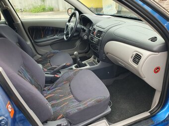 Nissan Almera 1,5 - 13