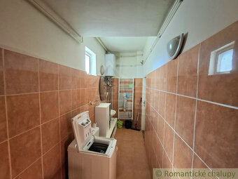 Prízemný rodinný dom v širšom centre mesta Lučenec. - 13