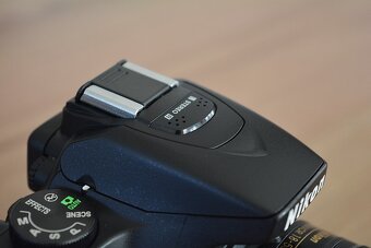 Nikon D5600 wifi BT - dotyk.dis. - VR objektiv AF-P 13tis.sn - 13