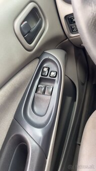 Nissan Almera N16 - 13