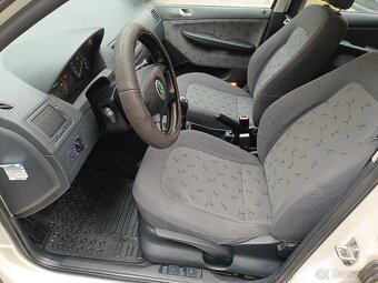 ŠKODA FABIA COMBI COMFORT 1,4 BENZÍN,16v, 74KW, KLIMATIZÁCIA - 13