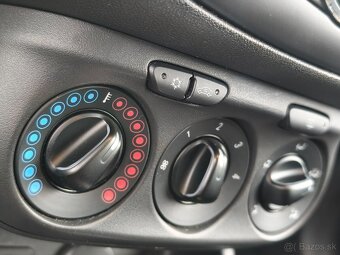 Opel Corsa E 1.4 - automat - 13