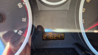 Opel Corsa 1.2i M5 59 kw SR - 13