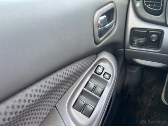 Nissan Almera 1.5 - 13
