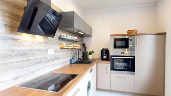 Moderný 3-izbový byt s balkónom a veľkou pivnicou v centre N - 13
