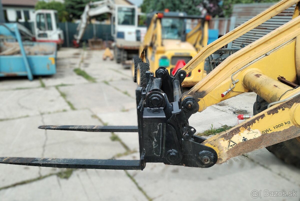 rýchloupínač a paletovacie vidly na traktorbáger komatsu WB - 14