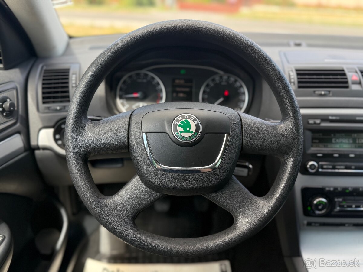Škoda Octavia Combi 1.6 TDI Ambiente (2012, 168.000km) - 14