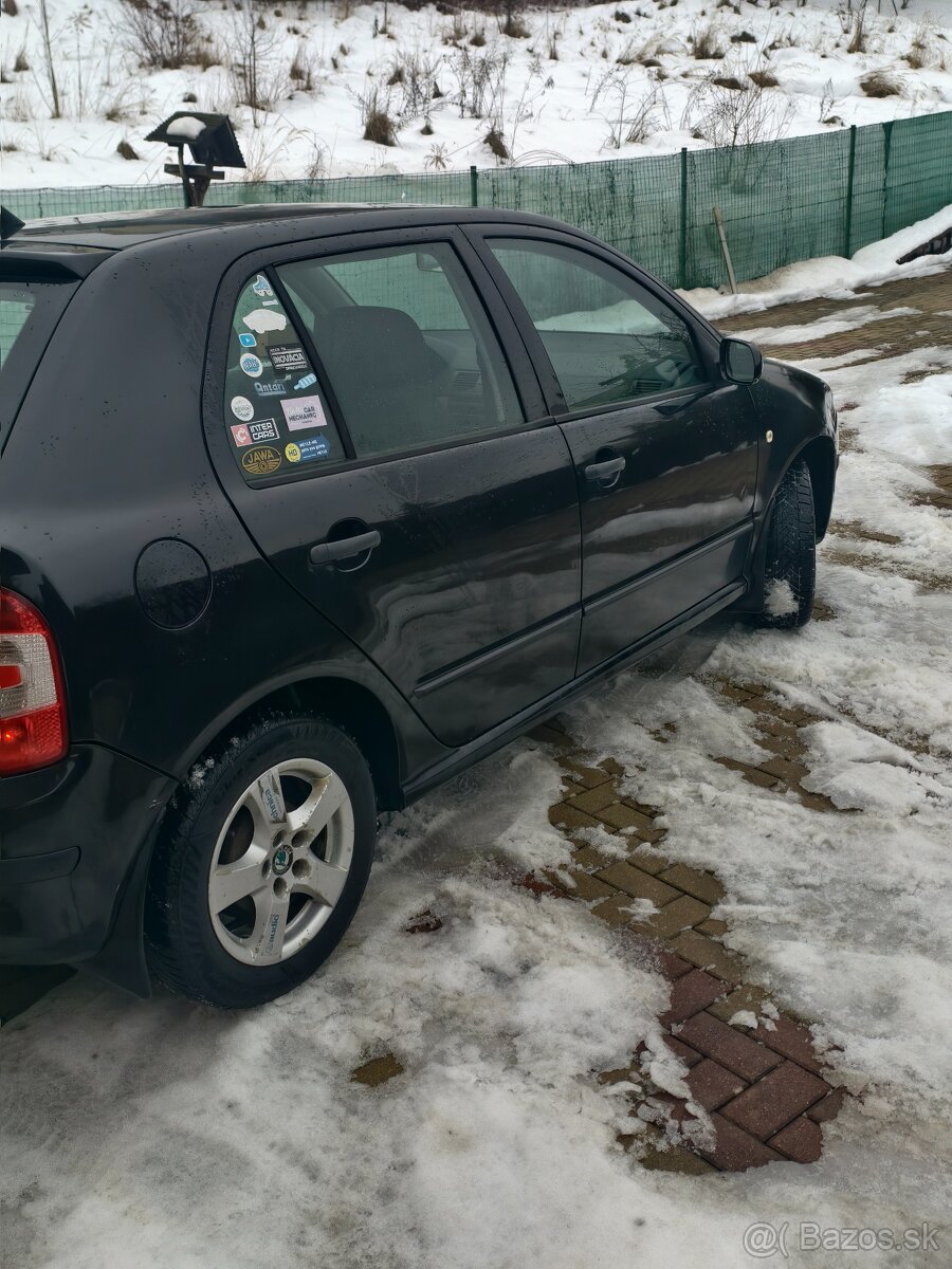 Škoda Fabia 1.2i - 14