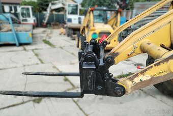 rýchloupínač a paletovacie vidly na traktorbáger komatsu WB - 14