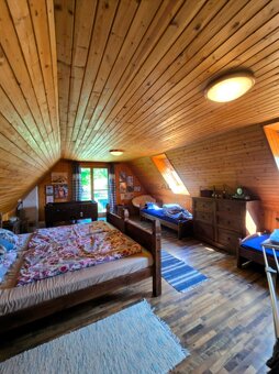 Na predaj drevenica s pozemkom - 1194 m² a bazénom v obci Mi - 14