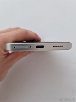 Xiaomi. - 14