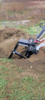 Univerzálni mini nakladač - 14