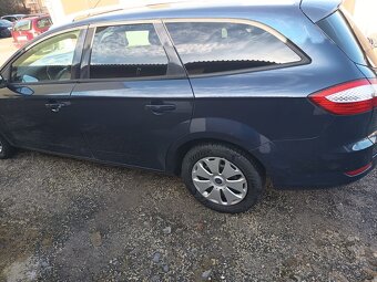 Ford Mondeo 1.8tdci kw:92 - 14