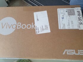 predam Asus VivoBook E203N - 14