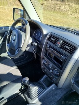 Suzuki Jimny  4x4 1.3 JLX - 14