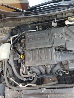 Mazda 3---1.6i-benzin--77Kw-105Ps-najazdené.-157300km - 14