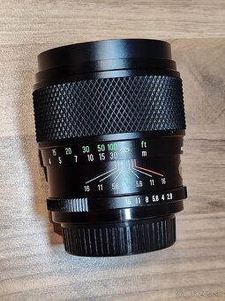 Kinofilm Revueflex AC-2 + objektivy 50/1.4 + 135/2.8 - 14