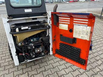Šmykovy nakladač Bobcat 453, 2 lyžice 2 páry kolies UNC - 14