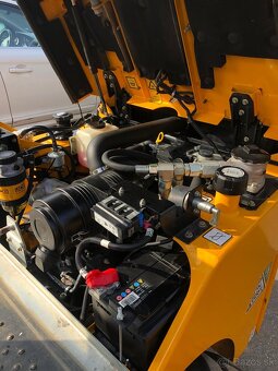 Kolový dumper JCB 1T - 2S5 - 14