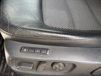Škoda Octavia Combi 2.0 TDI, Laurin & Klement, 2009 - 14