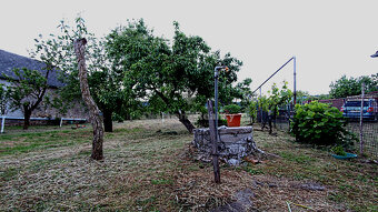 Rovinatý a slnečný pozemok v pokojnej obci Kašov - 14