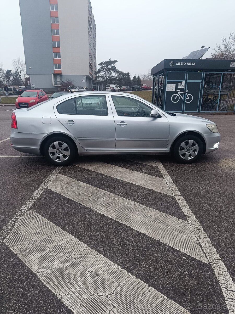 Škoda Octavia 2009 77kw 290 tis km - 15