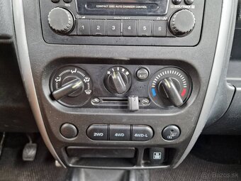 Suzuki Jimny 1.3i 63 kW 4x4 AC - 15