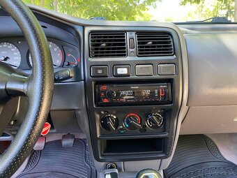 Nissan Almera N15 - 15