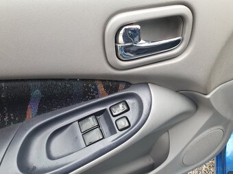 Nissan Almera 1,5 - 15