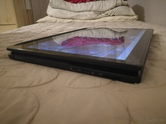 Asus. (2-v-1) konvertibilný notebook s dotykovým displejom. - 15