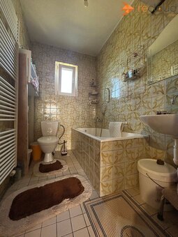 Rodinný dom s garážou v Hlohovci, časť Šulekovo - 15