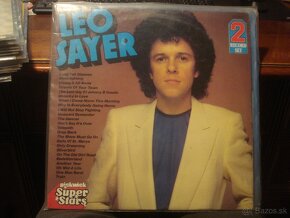 LP BOWIE COCKER B.HOLLY FOREIGNER ELO BYRDS E.JOHN MADONNA - 15
