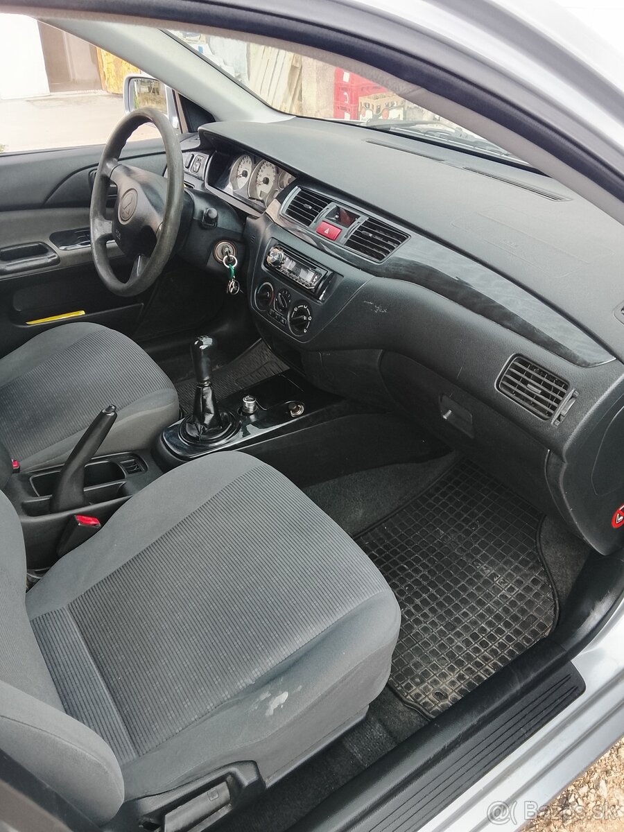 Predám mitsubishi lancer - 16