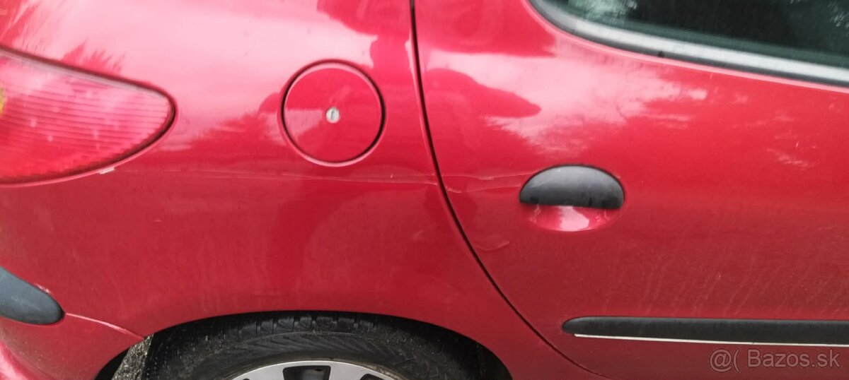 Peugeot 206 1.4i - 16