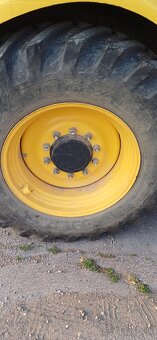 Traktorbager New Holland B110B - 16
