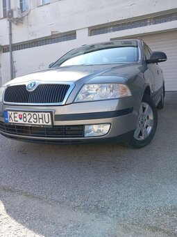 PREDÁM ŠKODA OCTAVIA COMBI1,6 BENZIN r11/2011 KÚP. NA SLOV . - 16