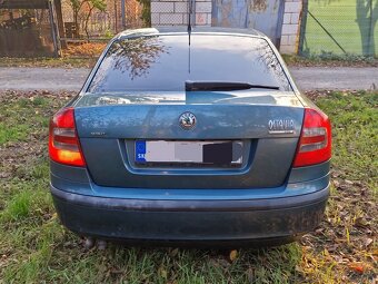 Skoda Octavia 1.9 tdi 77kw 105 ps sedan modrozelená METALIZA - 16