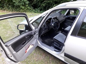 Suzuki SX4 1,6 benzín 88kw 4x4 r.2010 - 16