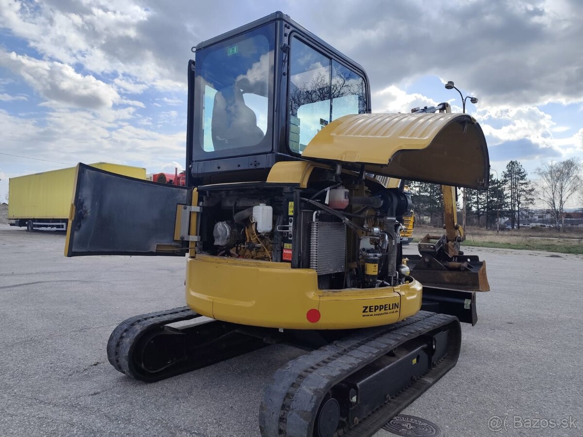 Bager Caterpillar 303.5. + hydraulická svahovačka. - 17