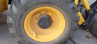 Traktorbager New Holland B110B - 17