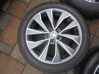 Alu disky Škoda 5x100, pneu 215/45 R16 č.12d - 17